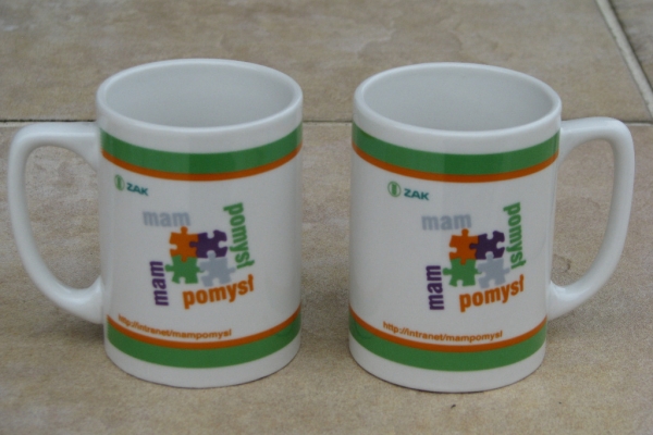 Ogłoszenie - Pamiątkowy kubek porcelanowy ZAK SA z motywem puzzli. Zdjęcie 2