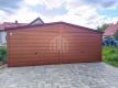 Ogłoszenie - Garaż blaszany 6x5m - 2x brama uchylna - ciemny orzech - drewnopodobny - dach dwuspadowy SO125. Miniaturka 2