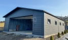Ogłoszenie - Garaż blaszany 8x8m + wiata 2m - brama segmentowa - drzwi - 4x okno - antracyt - rynny - dach dwuspadowy  ID1066. Miniaturka 2