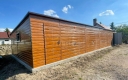Ogłoszenie - Garaż blaszany 16x5 m - 4x brama uchylna - 3x okno - 2x drzwi - jasny orzech - drewnopodobny - spad w tył TS1326. Miniaturka 5
