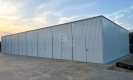 Ogłoszenie - Hala blaszana 24x8m - 8x brama dwuskrzydłowa - biały - dach spad w tył  TKD410. Miniaturka 6